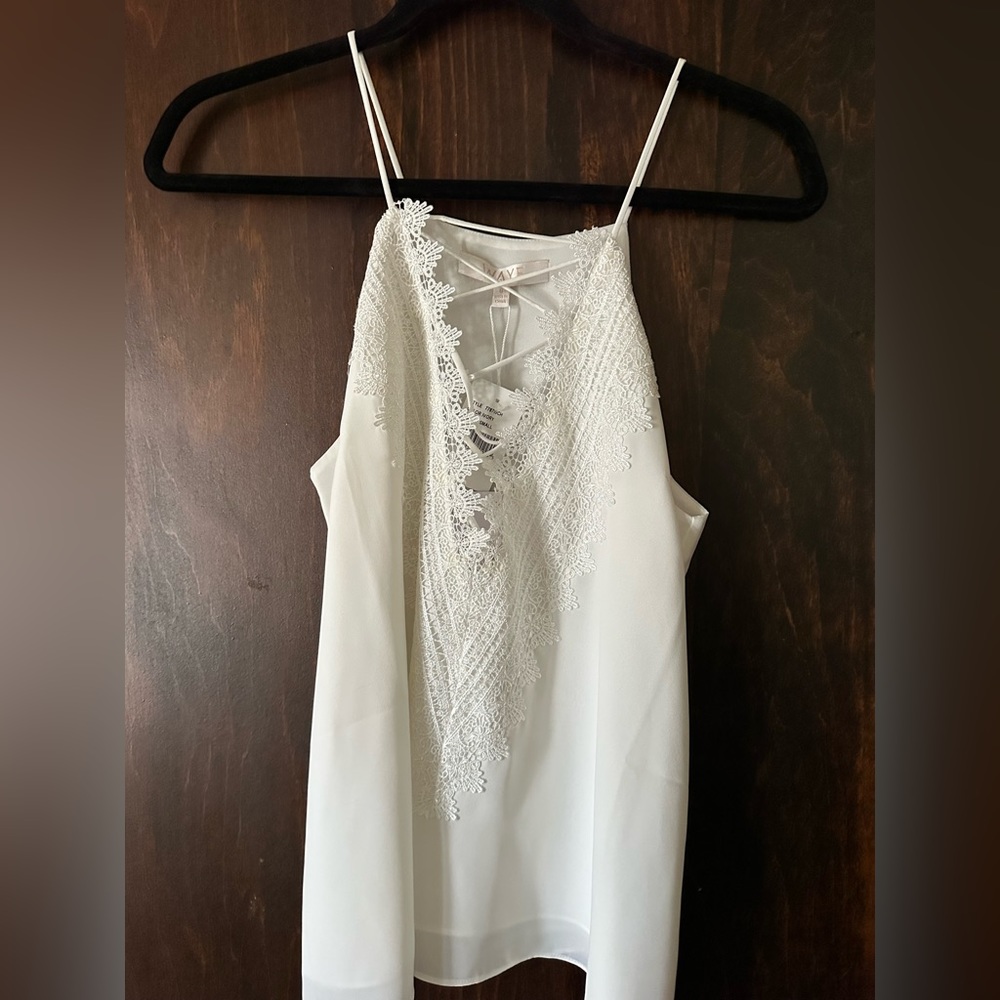 White sleeveless top